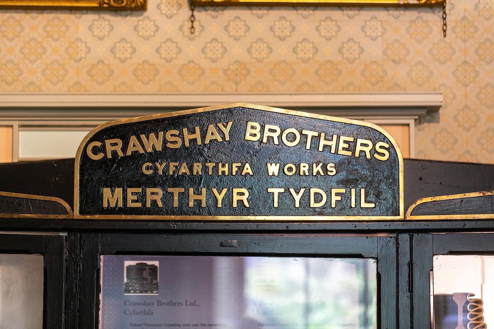 Gold text reading Cyfarthfa Brothers Merthyr Tydfil on black sign.jpg